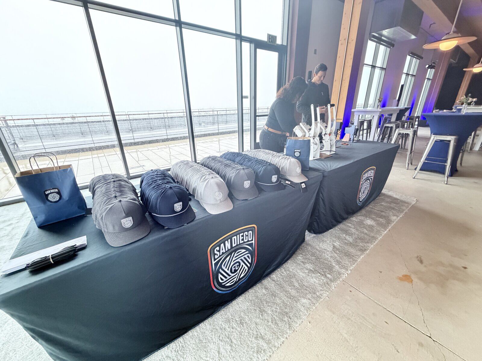 Wedding hat bar with caps ready for guests to personalize with patches